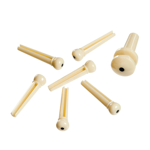 D'Addario Injected Molded Bridge Pins with End Pin, Set of 7, Ivory with Ebony Dot